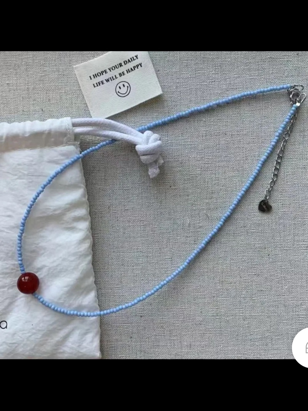 Light Blue Beaded Necklace with Red Accent